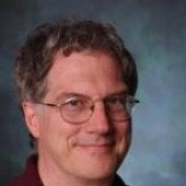 a simple headshot-style picture of Donald Morrison, smiling